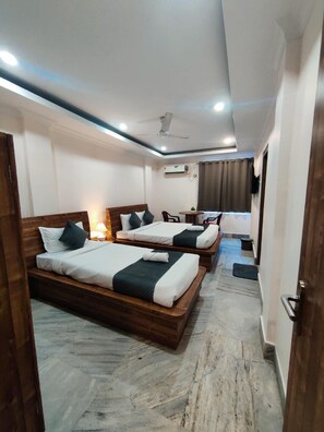 Deluxe driepersoonskamer | Gratis wifi, beddengoed