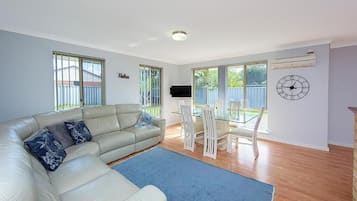 House, Multiple Beds, Non Smoking | Living area | 55-inch TV with digital channels