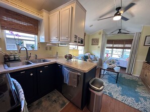 Fridge, microwave, oven, stovetop - Sunny & Cozy Resort Gem: Private Patio, Pool, Gym! (Sarasota)