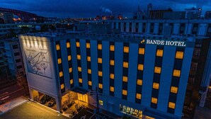 A multi-story hotel with a prominent sign reading "Bande Hotel." - BANDE HOTEL TEMPOZAN (Osaka)