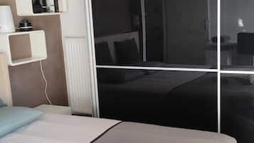 1 chambre, fer et planche Ă repasser, Wi-Fi, draps fournis