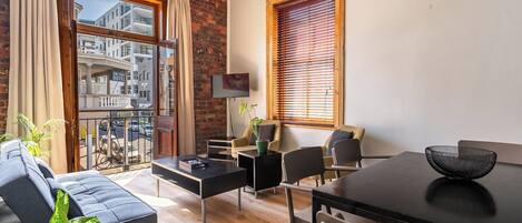 Standard Apartment, 1 Bedroom, Non Smoking, City View | Living area | 74-inch Smart TV with digital channels, Netflix, streaming services