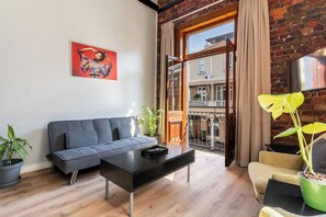 Standard Apartment, 1 Bedroom, Non Smoking, City View | Living area | 74-inch Smart TV with digital channels, Netflix, streaming services - Long Street Self Catering Apartments (Cape Town)