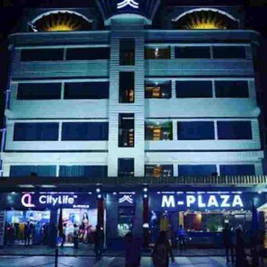 A multi-story building with signage for 'Citylife' and 'M-PLAZA'. - HOTEL M PLAZA DIGHA (Kanthi)