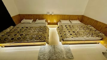 Family Room | Premium bedding, memory-foam beds, desk, free WiFi