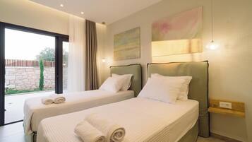 Phòng 2 giường đơn Deluxe, quang cảnh sân vườn | Két bảo mật tại phòng, màn/rèm cản sáng, phòng cách âm
