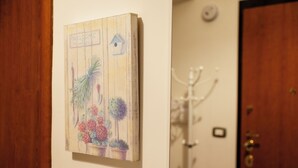A wooden door with a sign that reads "WELCOME TO MY GARDEN". - Casa di Ziva in Rome (Rome)