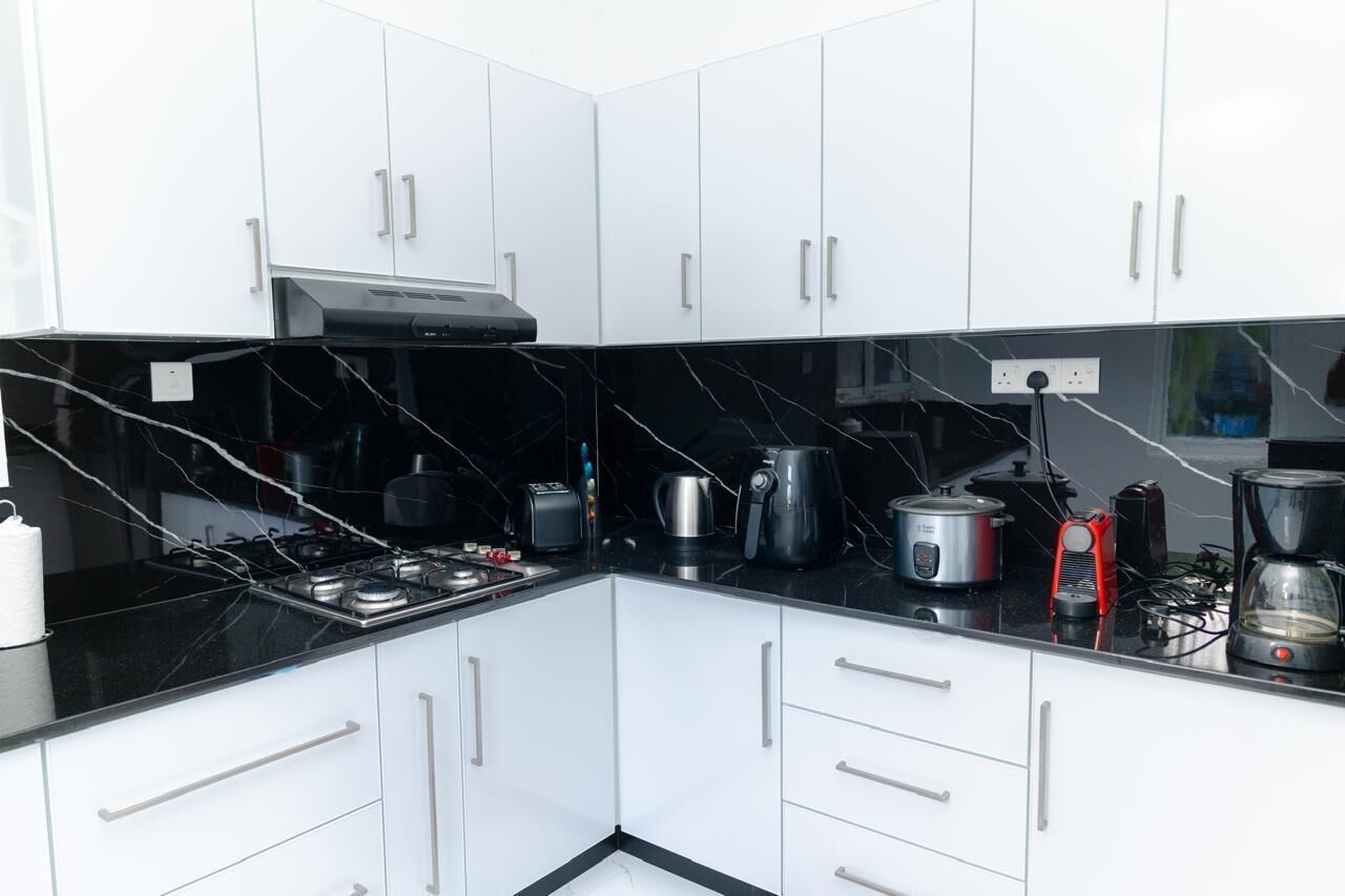 Apartamento Confort, varias camas, patio | Cocina compartida