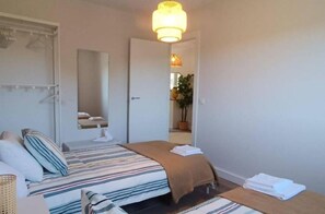 4 dormitorios, tabla de planchar con plancha, wifi gratis y ropa de cama