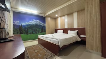 Premium bedding, desk, laptop workspace, rollaway beds
