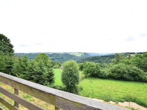 Escape to a serene valley view from this tranquil retreat, where nature's beauty unfolds.
