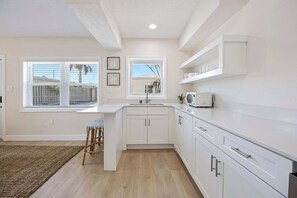 Fridge, microwave, coffee/tea maker, toaster