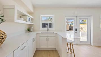 Fridge, microwave, coffee/tea maker, toaster