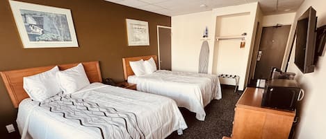 Premium bedding, desk, laptop workspace, iron/ironing board