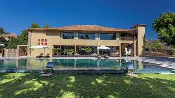 Outdoor pool, open 8:00 AM to 8:00 PM, pool umbrellas, pool loungers