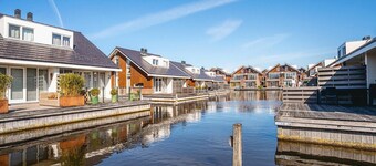 Woonboot in Waterpark met Privésteiger