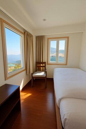 Superior Triple Room, Valley View | Living area | 42-inch Smart TV with digital channels