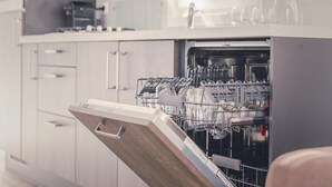 A modern kitchen with a dishwasher full of dishes. - Modern Bungalow with Garden in Twente (Rijssen)