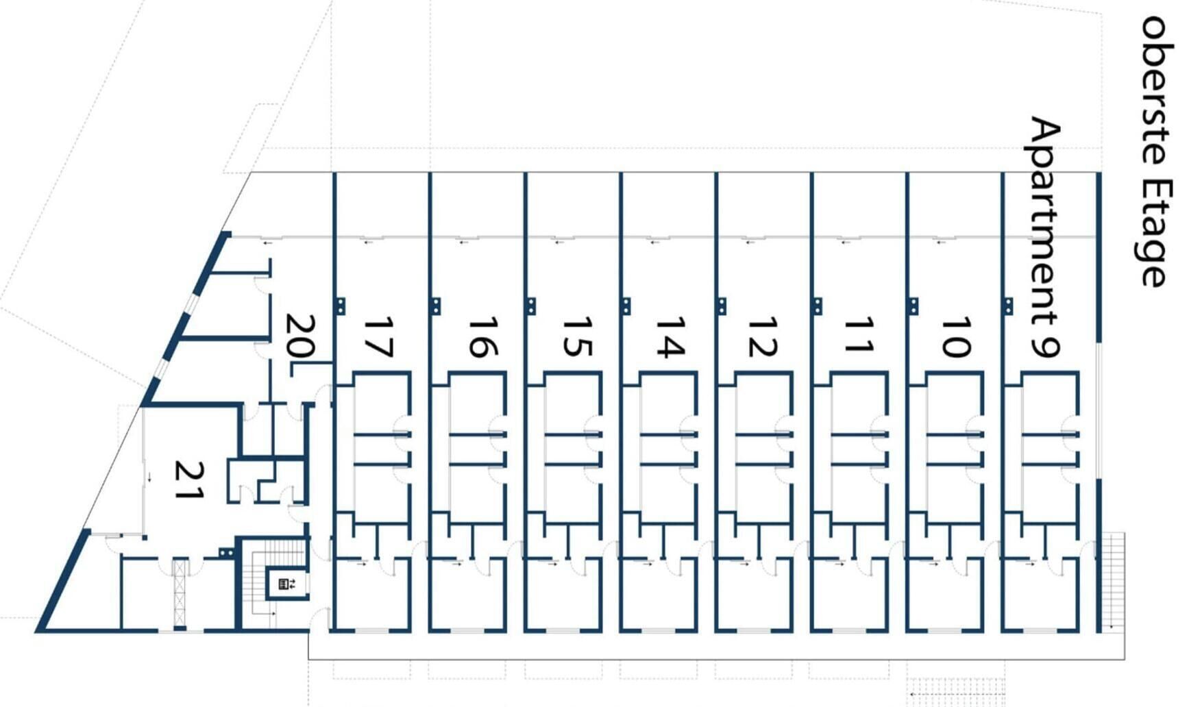 A floor plan of an apartment building with numbered units, including a staircase and a parking area.