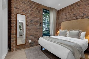 2 bedrooms, desk, iron/ironing board, travel crib