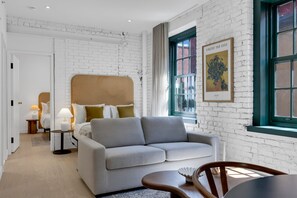 1 bedroom, desk, iron/ironing board, travel crib