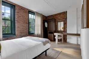 1 bedroom, desk, iron/ironing board, travel cot