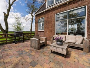 Terrace/patio - B&B farm Grutsk in Suwald with private harbour (Suwald)