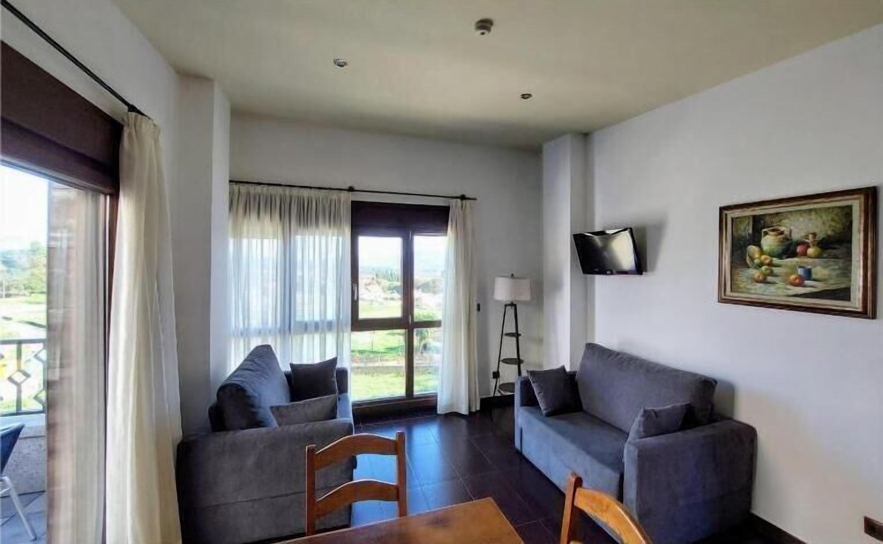 Apartment, Balcony, River View | Living area