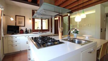 Apartment, Garden View | Private kitchen | Fridge, microwave, oven, stovetop