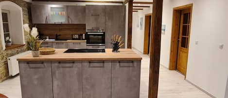 Fridge, oven, dishwasher, dining tables