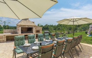 Outdoor dining - Luxury Villa with Private Pools, Sauna, Jacuzzi, and Exclusive Features in Istria, Croatia (Brtonigla)