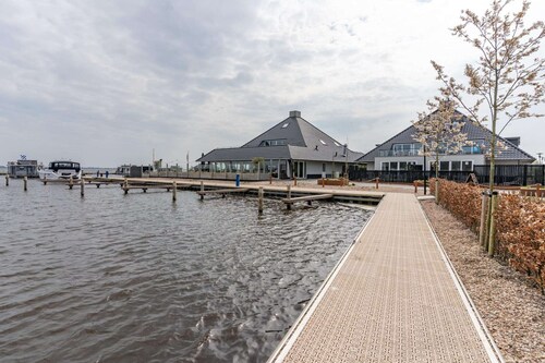 Holiday Home in Sneek with Waterfront Jetty