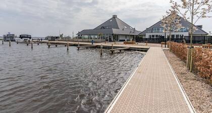 Holiday Home in Sneek with Waterfront Jetty