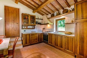 Fridge, oven, stovetop, dining tables