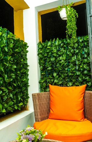 Departamento Deluxe, balcón, vista a la ciudad | Balcón