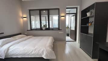 Superior Twin Room | Desk, laptop workspace, blackout drapes, iron/ironing board