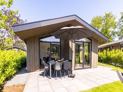 Chalet by Pond with Sauna