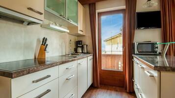 Fridge, oven, dishwasher, high chair