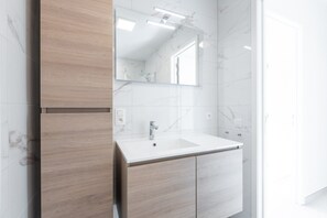 Een douche, een haardroger