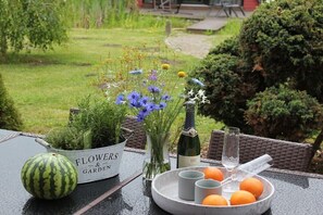 Outdoor dining - Holiday home Haus Annelie (Butjadingen \/ Burhave)