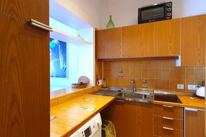 Fridge, stovetop, dining tables
