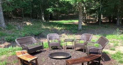 Beautiful new home nestled on 5.5 acres of Lake Michigan sand dunes