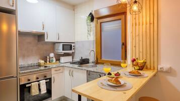 Superior Apartment, 1 Bedroom | Private kitchen | Full-sized fridge, microwave, oven, stovetop