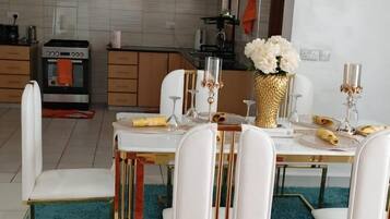 Family Apartment, Balcony, City View | Private kitchen | Fridge, microwave, cookware/dishes/utensils