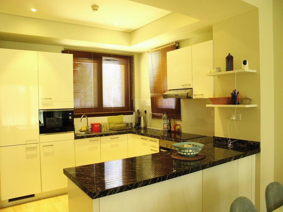 Fridge, microwave, cookware/dishes/utensils