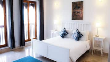 2 dormitorios, tabla de planchar con plancha, Internet y ropa de cama