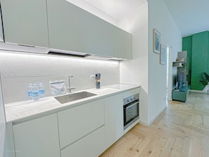 Oven, stovetop, dishwasher, coffee/tea maker
