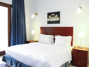 3 slaapkamers, een strijkplank/strijkijzer, beddengoed