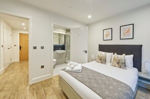 2 slaapkamers, een strijkplank/strijkijzer, beddengoed