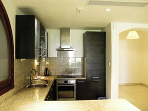 Fridge, microwave, cookware/dishes/utensils